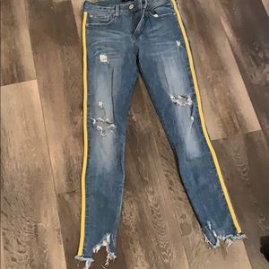 Light blue slightly ripped jeans